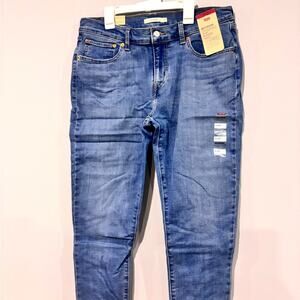 NWT Levi’s Boyfriend Stellar Stretch 31 x 27 tapered medium wash (size 12)